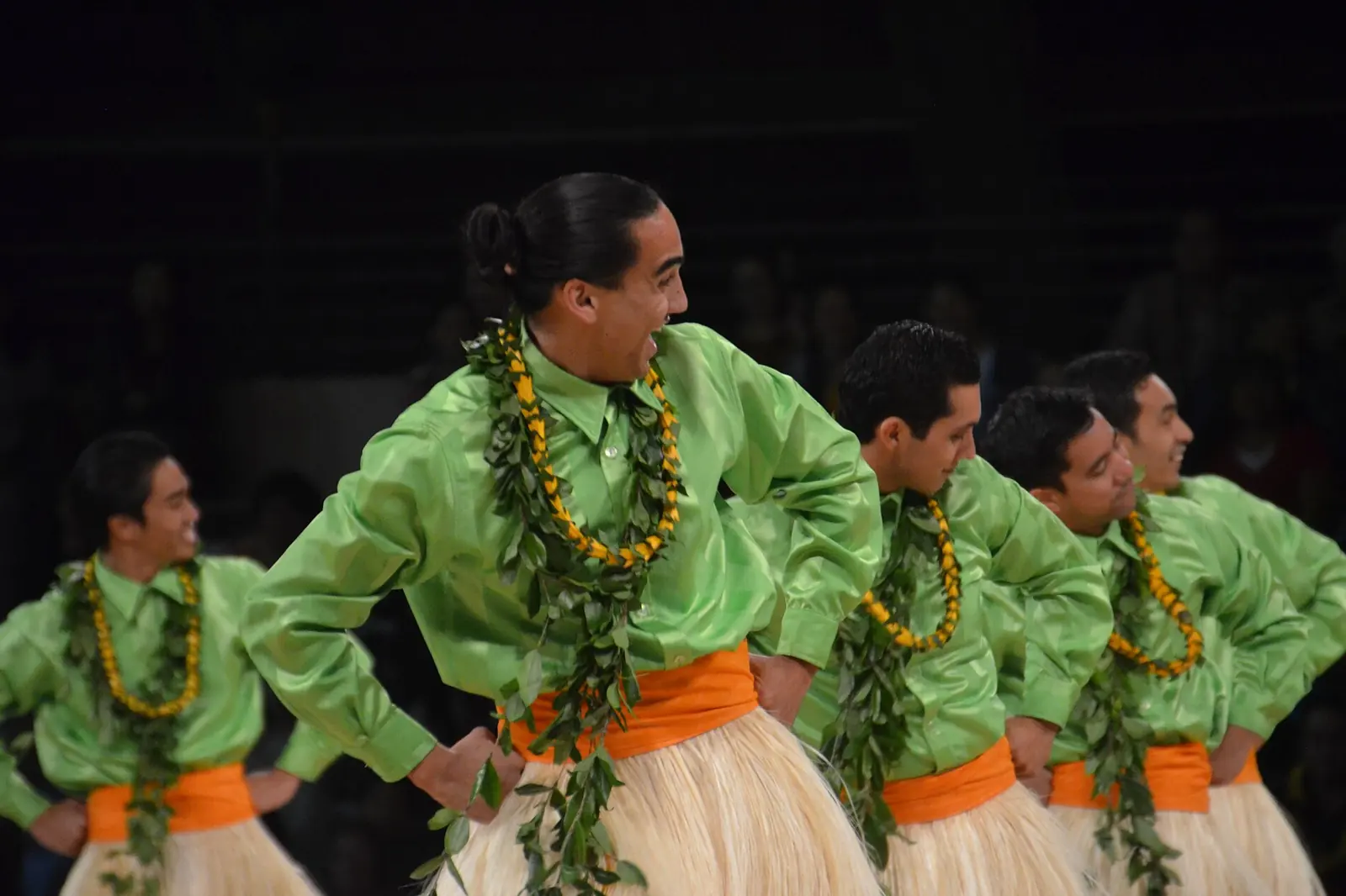 Hula ʻauana dancers on stage at the Merrie Monarch Festival in Hawaiʻi